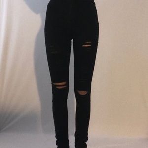 High waisted black distressed fashionnova jeans